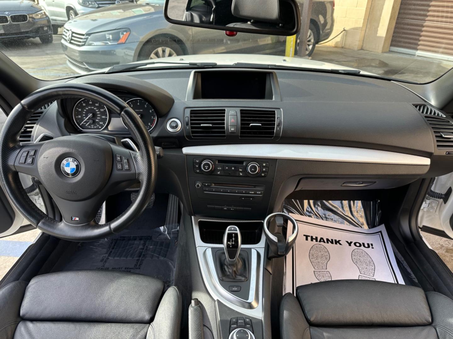 2011 WHITE /Black BMW 1-Series 135i Convertible (WBAUN7C56BV) with an 3.0L L6 DOHC 24V engine, Automatic transmission, located at 30 S. Berkeley Avenue, Pasadena, CA, 91107, (626) 248-7567, 34.145447, -118.109398 - Experience the Ultimate Driving Pleasure: 2011 BMW 135i Convertible Now Available in Pasadena, CA Discover the thrill of open-air driving with the 2011 BMW 135i Convertible, a perfect blend of luxury and performance, now featured at our BHPH dealership in Pasadena, CA. This exquisite convertible - Photo#13